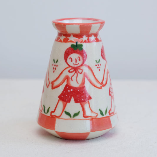 red fruits vase
